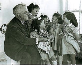 Dr. Dafoe with quintuplets